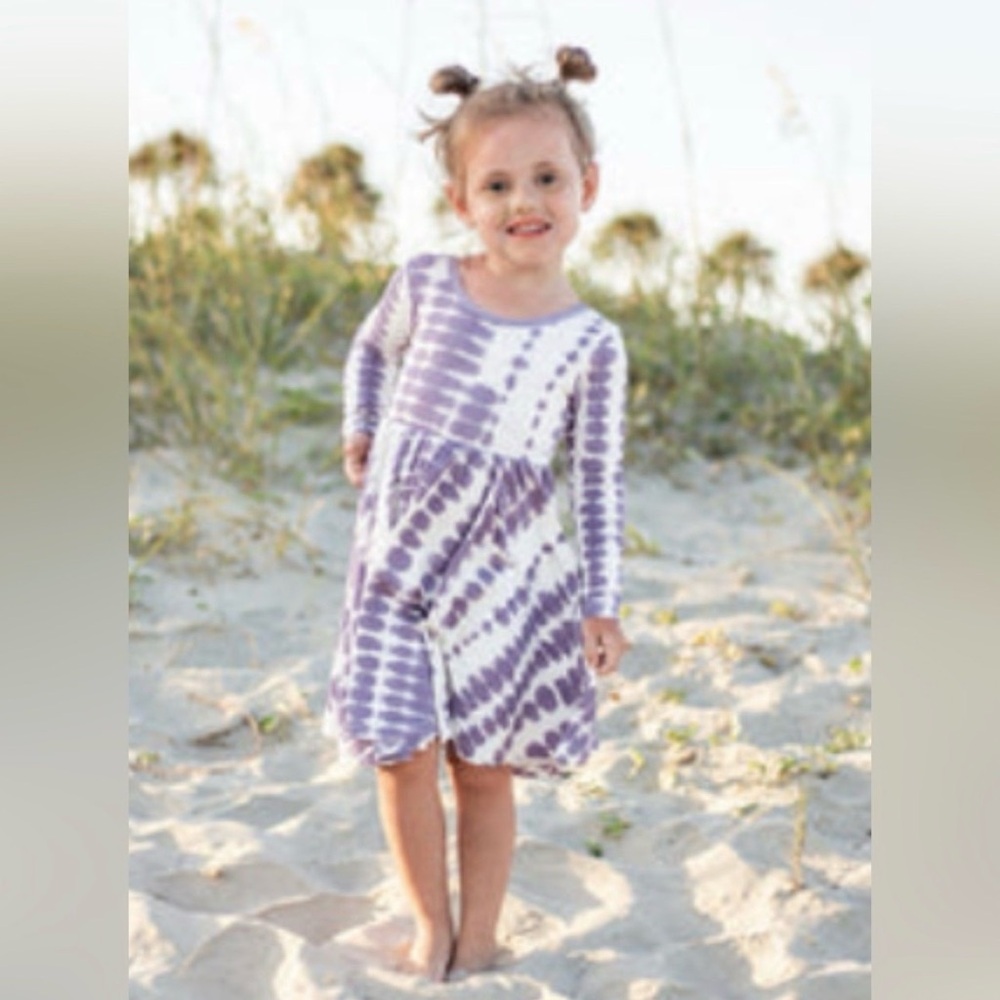 Kyte toddler long sleeve twirl dress in taro rip tide